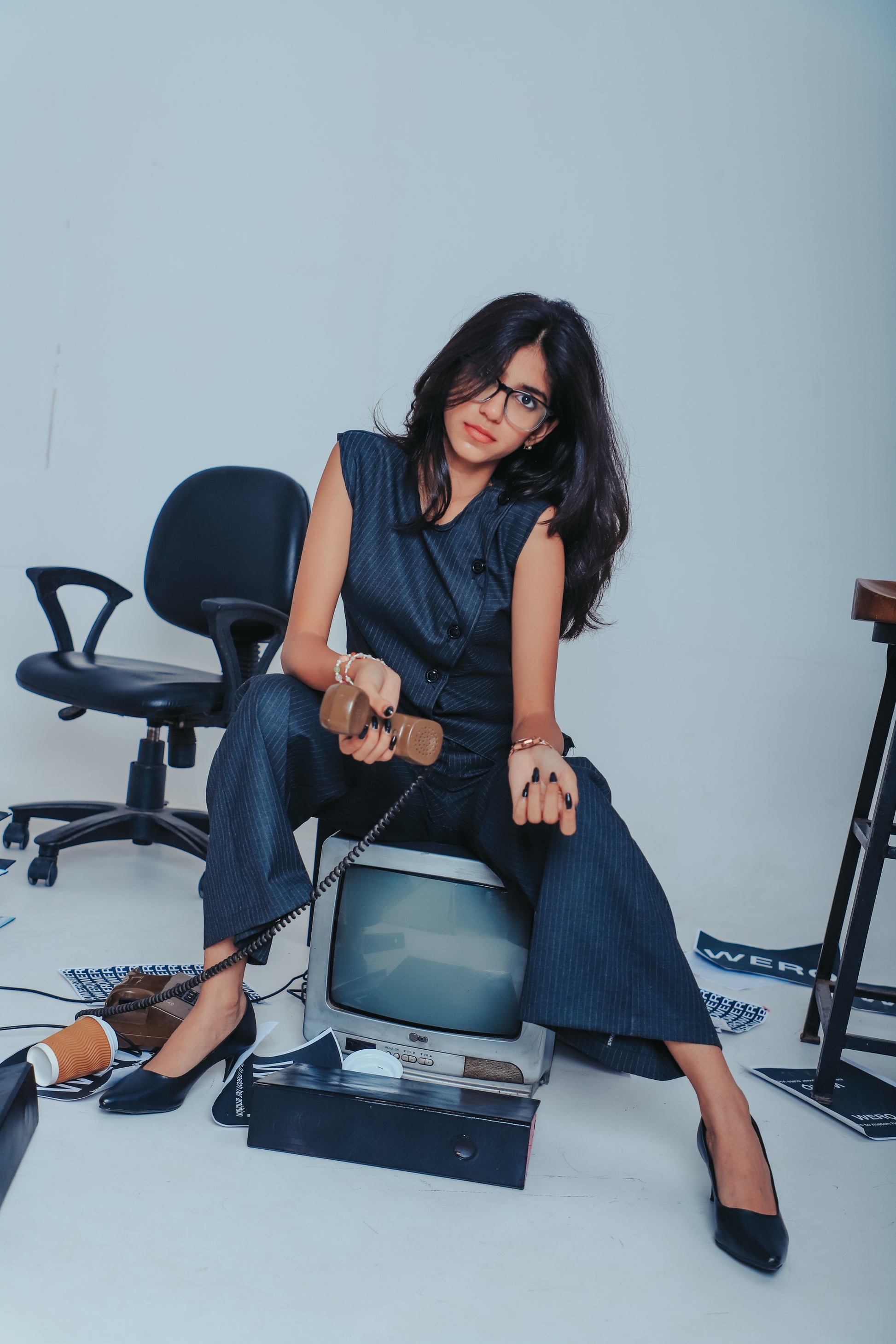 pinstripe power dressing set, office co-ord for women, blazer set with feminine detail, confident Indian outfit, WERQ grey tailoring, workwear for women in India, bootcut trousers with blazer, sharp Indian co-ord, formal outfit set, sustainable Indian fas