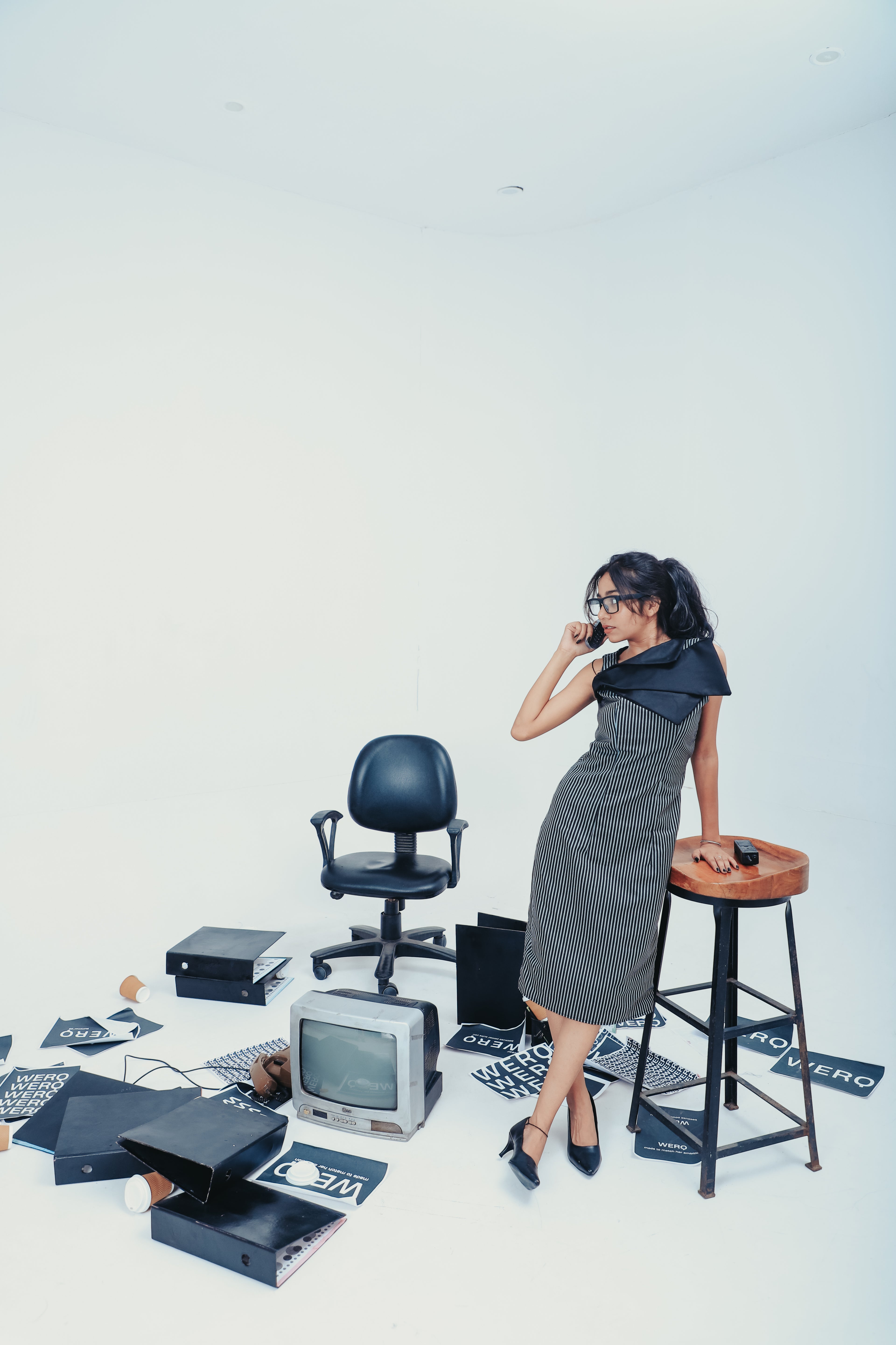 The Fold Dress – Black Pinstripe Dress with Sculpted Neckline
