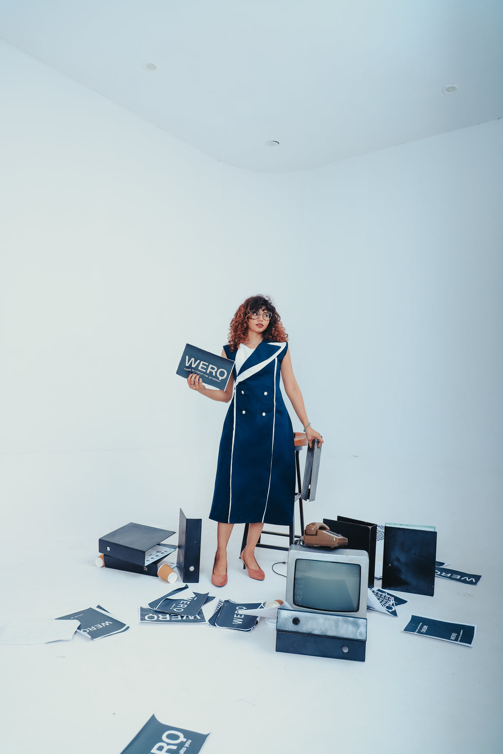WERQ blue dress style, dress with tailored finish, structured minimal formalwear, white-lapel navy dress, Indian dress with clean lines, fitted dress for working women, power silhouette fashion, premium collar dress, Indian women’s office clothing, navy s