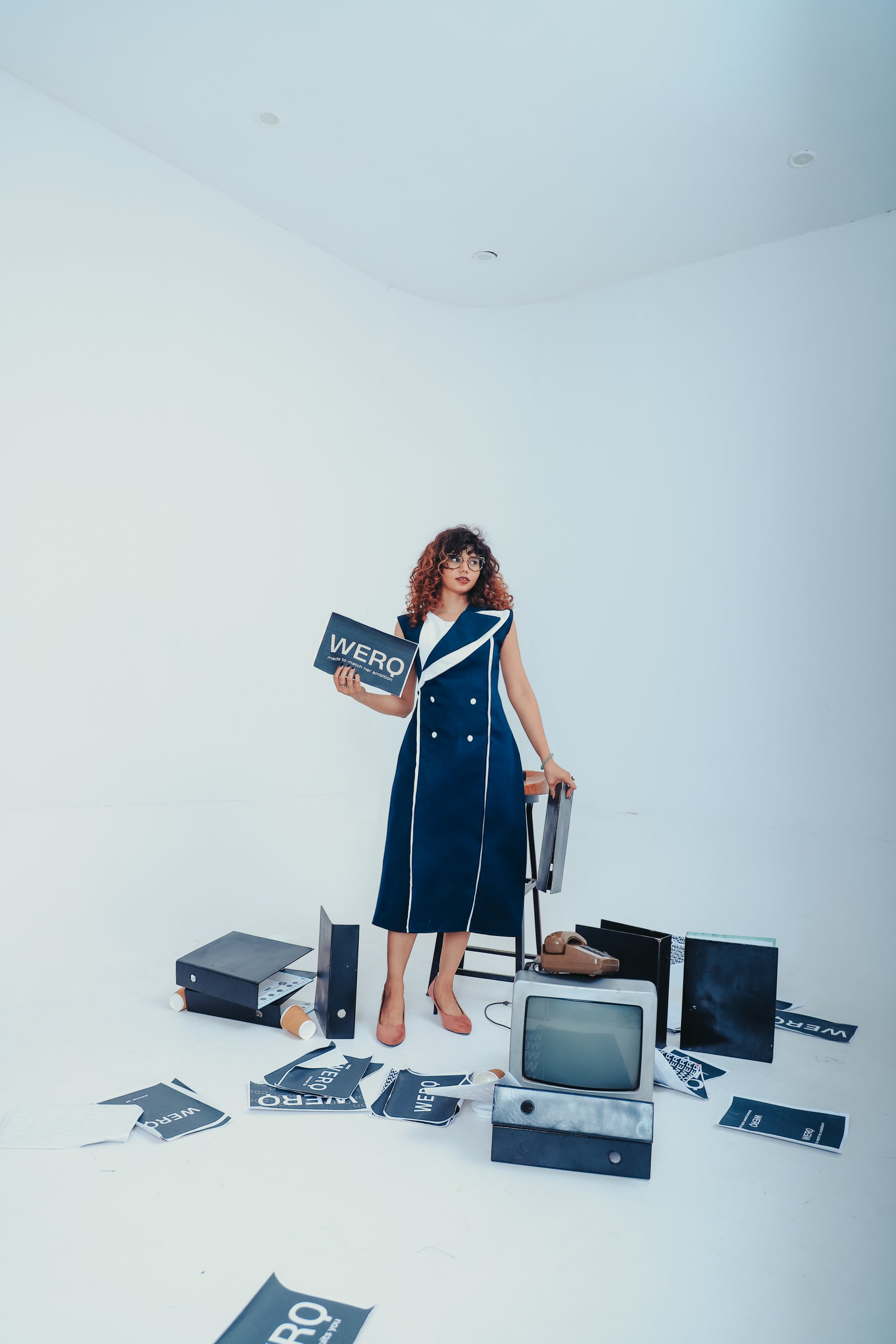 WERQ blue dress style, dress with tailored finish, structured minimal formalwear, white-lapel navy dress, Indian dress with clean lines, fitted dress for working women, power silhouette fashion, premium collar dress, Indian women’s office clothing, navy s