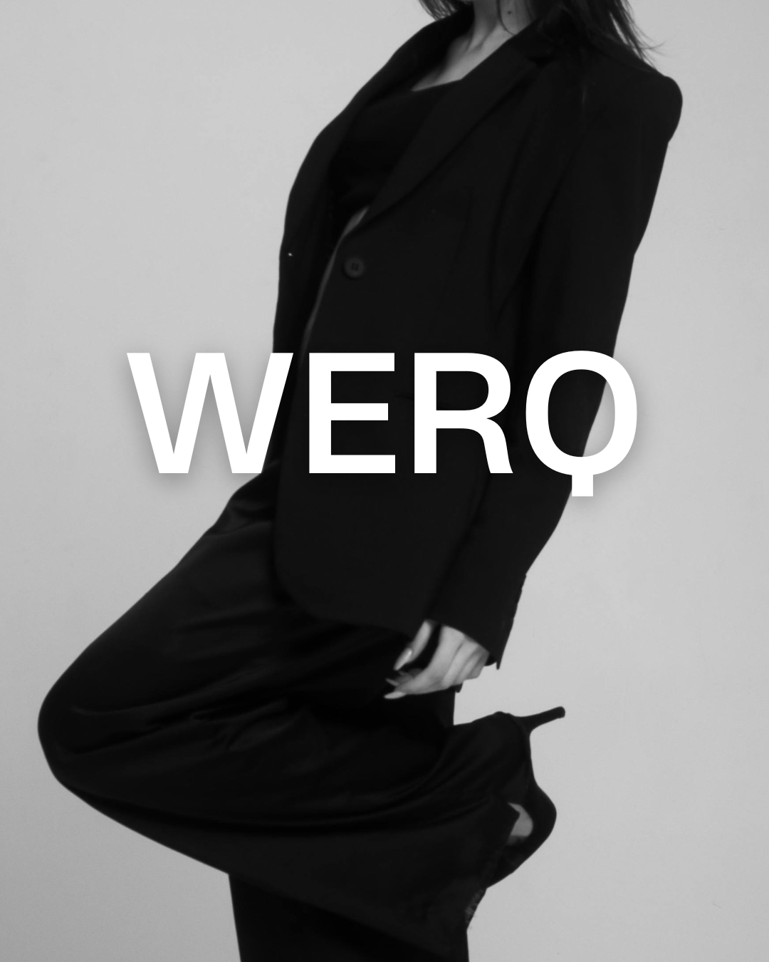 Confident woman in tailored power suit from WERQ, Indian premium formal wear brand for ambitious women. Woman wearing structured blazer and trousers from WERQ, sustainable formalwear brand in India. Luxury women’s formal suit by WERQ, Indian power dressing label with sustainable tailoring.
